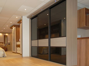 Bronze Mirrors and Champagne Avola Sliding Doors
